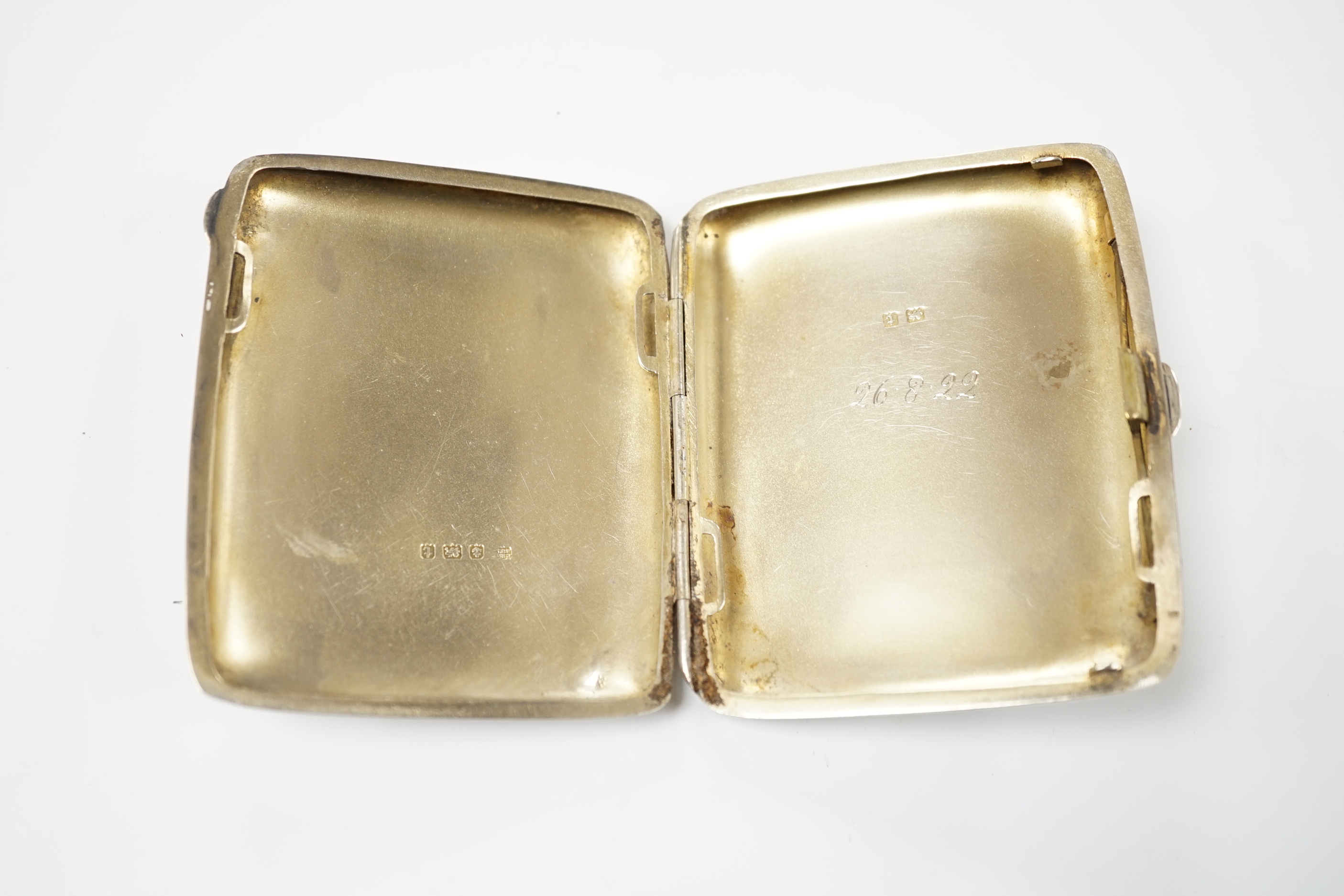 A George V silver cigarette case, Birmingham 1918, 8.5cm, 99 grams
